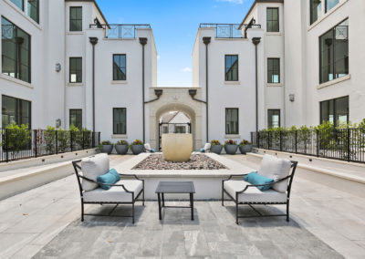 Corvalla luxury condo courtyard with patio and fireplace