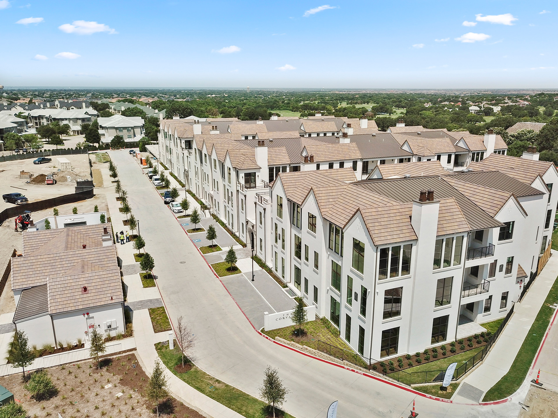 A side aerial view of the luxury condos at the Corvalla