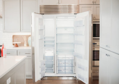 Interior of the high end fridge featured in the kitchen of condos at the Corvalla