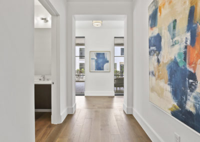 Hallway with high end trim and luxury finishings in condo at the Corvalla